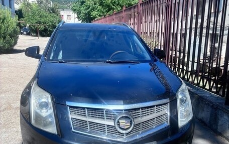 Cadillac SRX II рестайлинг, 2011 год, 290 000 рублей, 2 фотография