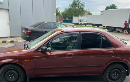 Mazda 323, 2001 год, 265 000 рублей, 8 фотография