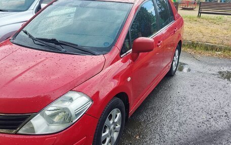Nissan Tiida, 2010 год, 700 000 рублей, 1 фотография