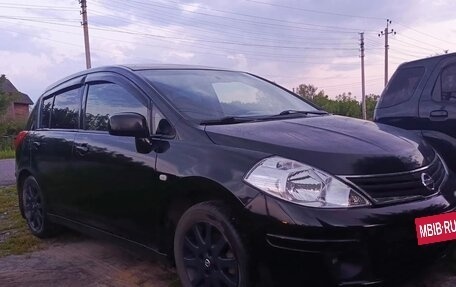 Nissan Tiida, 2010 год, 525 000 рублей, 21 фотография