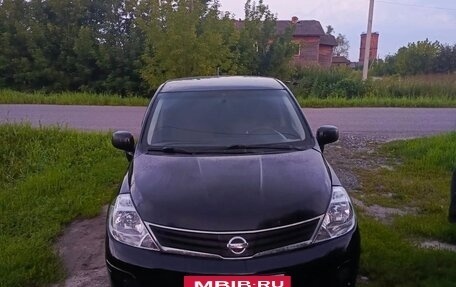 Nissan Tiida, 2010 год, 525 000 рублей, 23 фотография