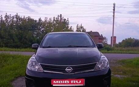 Nissan Tiida, 2010 год, 525 000 рублей, 24 фотография