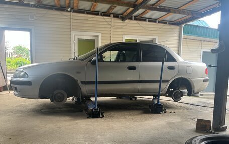 Mitsubishi Carisma I, 2001 год, 230 000 рублей, 11 фотография
