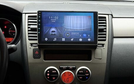 Nissan Tiida, 2011 год, 749 000 рублей, 20 фотография