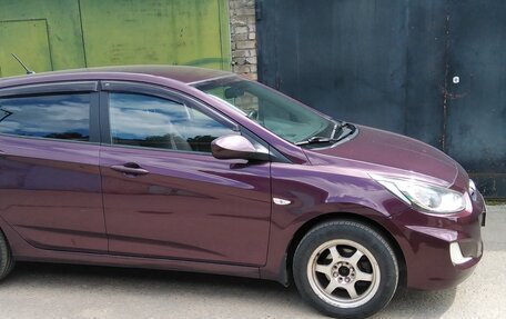 Hyundai Solaris II рестайлинг, 2011 год, 670 000 рублей, 2 фотография