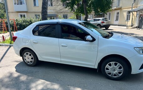 Renault Logan II, 2021 год, 900 000 рублей, 2 фотография
