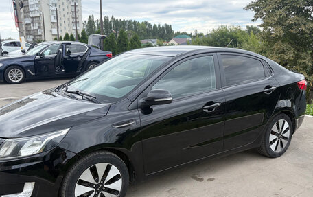 KIA Rio III рестайлинг, 2011 год, 880 000 рублей, 3 фотография