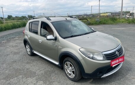 Renault Sandero I, 2013 год, 650 000 рублей, 2 фотография