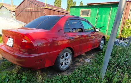 Mitsubishi Mirage VI рестайлинг, 2001 год, 500 000 рублей, 4 фотография