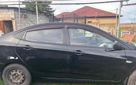 Hyundai Solaris II рестайлинг, 2011 год, 600 000 рублей, 4 фотография