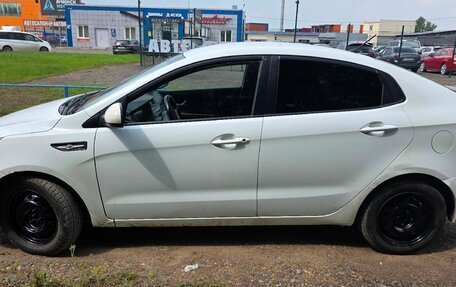 KIA Rio III рестайлинг, 2012 год, 650 000 рублей, 16 фотография