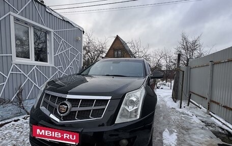 Cadillac SRX II рестайлинг, 2011 год, 850 000 рублей, 4 фотография