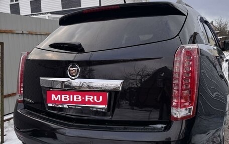 Cadillac SRX II рестайлинг, 2011 год, 850 000 рублей, 3 фотография