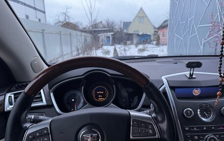 Cadillac SRX II рестайлинг, 2011 год, 850 000 рублей, 13 фотография