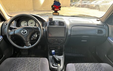 Mazda Protege, 2002 год, 310 000 рублей, 8 фотография