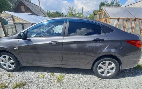 Hyundai Solaris II рестайлинг, 2011 год, 850 000 рублей, 4 фотография