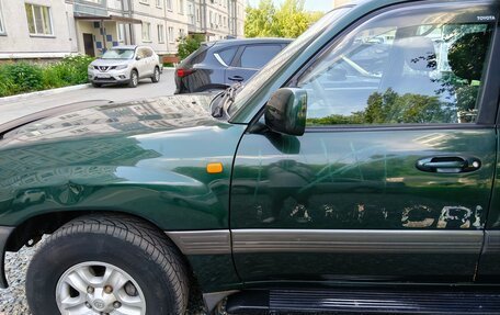Toyota Land Cruiser 100 рестайлинг 2, 1998 год, 1 500 000 рублей, 9 фотография