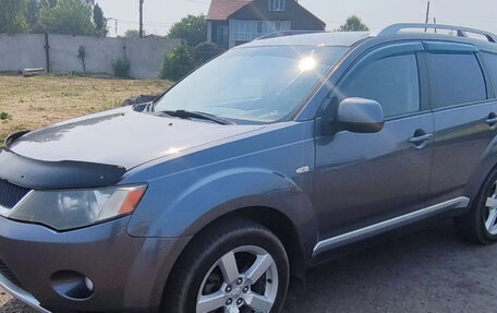 Mitsubishi Outlander III рестайлинг 3, 2007 год, 960 000 рублей, 2 фотография