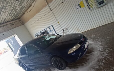 Mitsubishi Carisma I, 2001 год, 195 000 рублей, 11 фотография