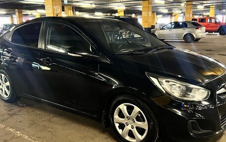 Hyundai Solaris II рестайлинг, 2011 год, 650 000 рублей, 10 фотография