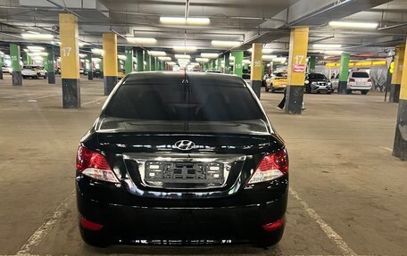 Hyundai Solaris II рестайлинг, 2011 год, 650 000 рублей, 13 фотография