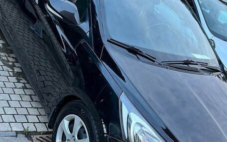 Hyundai Solaris II рестайлинг, 2011 год, 650 000 рублей, 19 фотография