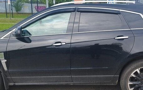 Cadillac SRX II рестайлинг, 2011 год, 750 000 рублей, 3 фотография
