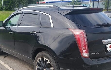 Cadillac SRX II рестайлинг, 2011 год, 750 000 рублей, 4 фотография