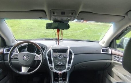 Cadillac SRX II рестайлинг, 2011 год, 750 000 рублей, 6 фотография