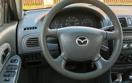 Mazda Protege, 2000 год, 265 000 рублей, 3 фотография