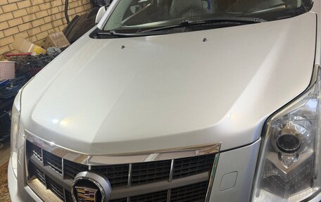 Cadillac SRX II рестайлинг, 2011 год, 1 000 000 рублей, 1 фотография