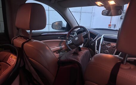 Cadillac SRX II рестайлинг, 2011 год, 1 050 000 рублей, 13 фотография