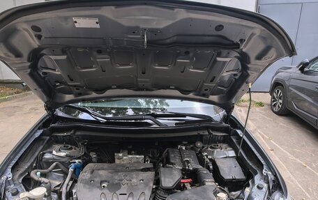 Mitsubishi Outlander III рестайлинг 3, 2012 год, 990 000 рублей, 10 фотография