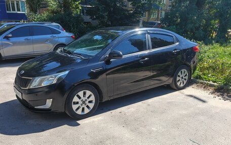 KIA Rio III рестайлинг, 2013 год, 630 000 рублей, 11 фотография