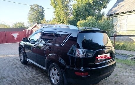 Mitsubishi Outlander III рестайлинг 3, 2010 год, 870 000 рублей, 4 фотография