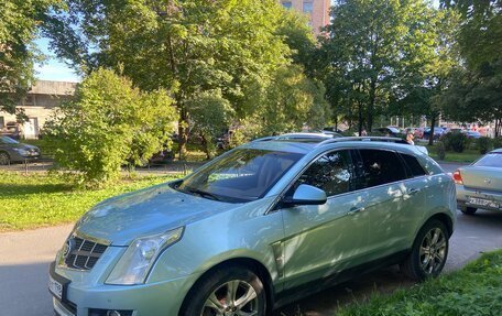Cadillac SRX II рестайлинг, 2011 год, 890 000 рублей, 3 фотография