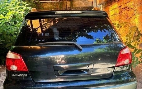 Mitsubishi Outlander III рестайлинг 3, 2005 год, 690 000 рублей, 2 фотография