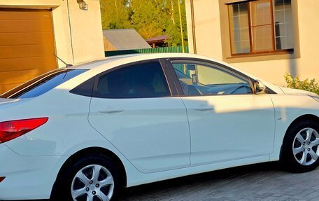 Hyundai Solaris II рестайлинг, 2011 год, 670 000 рублей, 5 фотография