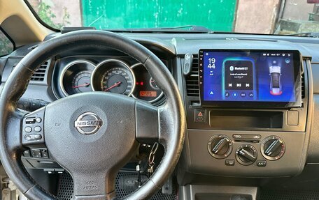 Nissan Tiida, 2010 год, 590 000 рублей, 7 фотография