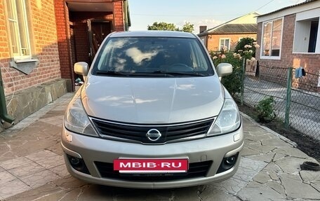 Nissan Tiida, 2010 год, 590 000 рублей, 3 фотография