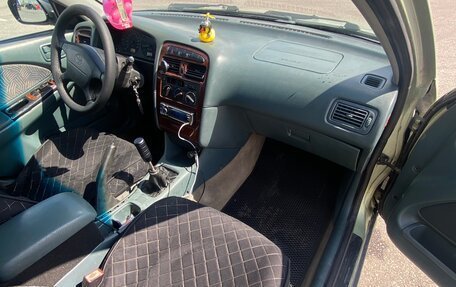 Toyota Avensis III рестайлинг, 1998 год, 275 000 рублей, 17 фотография