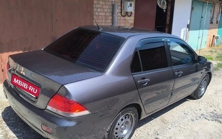 Mitsubishi Lancer IX, 2009 год, 425 000 рублей, 26 фотография