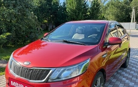 KIA Rio III рестайлинг, 2013 год, 750 000 рублей, 2 фотография