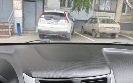 Hyundai Solaris II рестайлинг, 2012 год, 590 000 рублей, 21 фотография