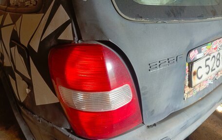 Mazda 323, 1998 год, 150 000 рублей, 5 фотография