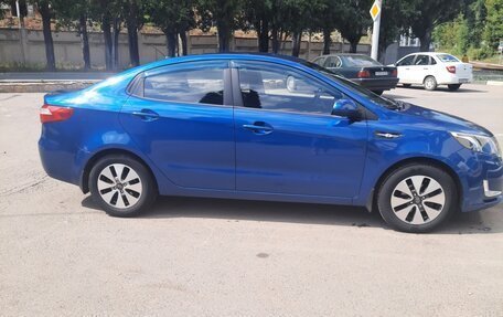 KIA Rio III рестайлинг, 2011 год, 750 000 рублей, 2 фотография