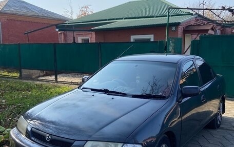 Mazda Familia, 1996 год, 145 000 рублей, 1 фотография