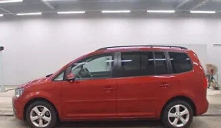 Volkswagen Touran III, 2013 год, 710 485 рублей, 1 фотография