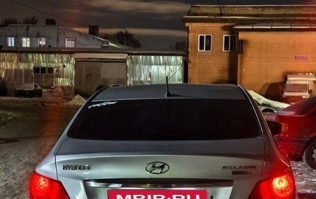 Hyundai Solaris II рестайлинг, 2011 год, 680 000 рублей, 23 фотография