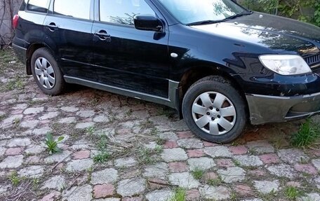 Mitsubishi Outlander III рестайлинг 3, 2007 год, 900 000 рублей, 6 фотография